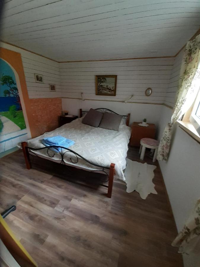 Kapteni Suvekodu Laulasmaa Buitenkant foto